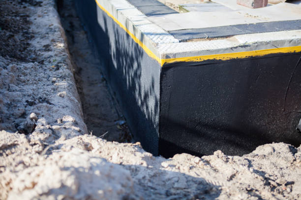 Professional Waterproofing technician working in Montclair, VA